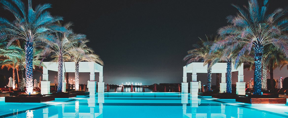 uae-travel-night-pool-party-background